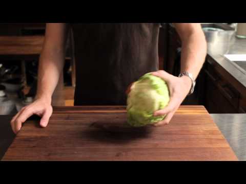 Slam your iceberg/lettuce against a cutting board or shelf and remove the core head of lettuce iceberg easily. 